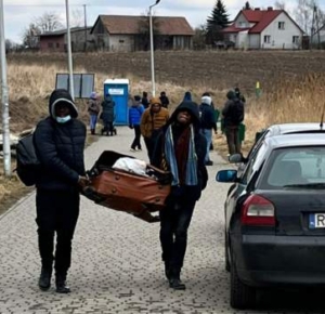 Ukrainians head home ready to die for their country